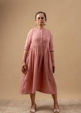 A Model Wearing Pink Organic Cotton Kara Rose Dress, curated by Only Ethikal