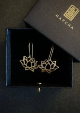 A Model Wearing Gold 18k Gold plated over brass Padma Lotus Earrings, curated by Only Ethikal