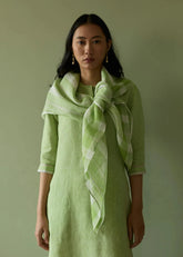A Model Wearing Green Linen Ilma Metallic Stripes Handwoven Linen Scarf- Meadow, curated by Only Ethikal