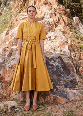 A Model Wearing Yellow Pure Cotton Those Days Midi Dress curated by Only Ethikal