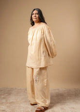 A Model Wearing Beige Organic Cotton Firefly Flicker Top, curated by Only Ethikal