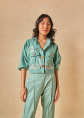 A Model Wearing Green Organic Cotton Ocean Oasis handwoven jacket, curated by Only Ethikal