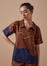 A Model Wearing Brown / Blue Organic Cotton Prestige Top, curated by Only Ethikal
