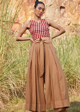 A Model Wearing Brown Pure Cotton Lost In Chase Pleated Trouser curated by Only Ethikal