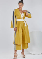 A Model Wearing Yellow Pure Cotton Amaya Ochre/ Mustard Long Jacket, curated by Only Ethikal