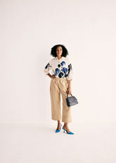 A Model Wearing Beige Pure Cotton Women Sand Trousers curated by Only Ethikal