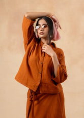 A Model Wearing Orange Organic Cotton Shirin Oversized Shirt, curated by Only Ethikal