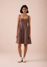 A Model Wearing Brown Handwoven Cotton Hazel Sun Handspun Handwoven Organic Cotton Pleated Mini Dress, curated by Only Ethikal