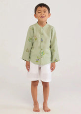 A Model Wearing White Linen Kids Kei Timeless Linen Shorts- White, curated by Only Ethikal