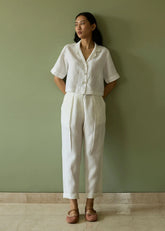 A Model Wearing White Linen Kiera Cuban Collar Linen Co-Ord Set- Ivory, curated by Only Ethikal