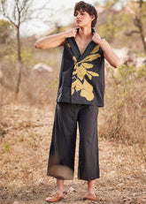 A Model Wearing White Cotton Mul Coturnix Pants,curated by Only Ethikal