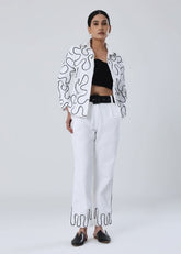 A Model Wearing White Cotton Twill Pearl Blazer, curated by Only Ethikal
