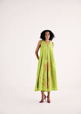 A Model Wearing Green Cotton Mul LimeadeJumpsuit,curated by Only Ethikal