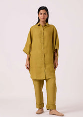 A Model Wearing Olive Linen Pip Olive Linen Pants, curated by Only Ethikal