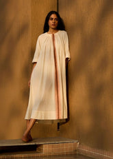 A Model Wearing White Handwoven Cotton Bulan Handwoven Striped Midi Dress , curated by Only Ethikal