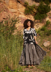 A Model Wearing Black Pure Cotton Longing Days Maxi Dress curated by Only Ethikal