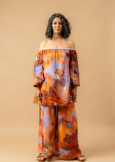 A Model Wearing Orange Organic Cotton Firefly Flicker Printed Set, curated by Only Ethikal