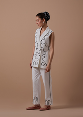 A Model Wearing White Organic Cotton Verona Blazer, curated by Only Ethikal