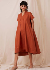 A Model Wearing Cotton Pina Rust Cotton Dress, curated by Only Ethikal