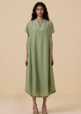 A Model Wearing Green Cotton silk Meer Green Kaftan , curated by Only Ethikal