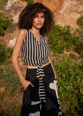 A Model Wearing Black Pure Cotton Desire of Elixir Pleated Trouser curated by Only Ethikal