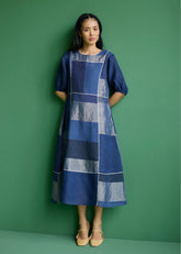 A Model Wearing Navy Linen Sehr Metallic Linen Piping Dress- Navy, curated by Only Ethikal