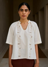 A Model Wearing White Handwoven Cotton Bheer Handwoven Embroidered Top , curated by Only Ethikal