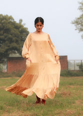 A Model Wearing Beige Bemberg Yayoi Beige Dress, curated by Only Ethikal