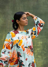 A Model Wearing Green Upcycled Fabric Tyana Printed Dress, curated by Only Ethikal