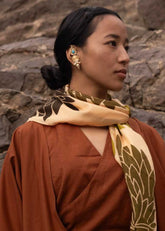 A Model Wearing Gold 18k Gold plated over brass Turquoise Na-Gyen Akor Earcuffs, curated by Only Ethikal