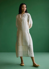 A Model Wearing Ivory Linen Nura Metallic Linen Paneled Dress- Ivory, curated by Only Ethikal