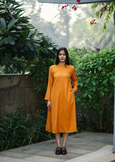 A Model Wearing Yellow Wool Yellowstarflowerdress , curated by Only Ethikal