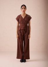 A Model Wearing Brown Organic Cotton The Berry Bright Everyday Organic Cotton Wrap Top, curated by Only Ethikal