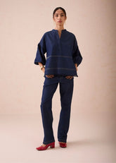 A Model Wearing Blue Denim The Little Things Denim Blouse, curated by Only Ethikal