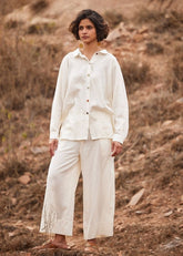 A Model Wearing White Cotton Mul Heer co ord set curated by Only Ethikal
