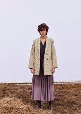 A Model Wearing Beige Pure Cotton Stone Floral Jacket curated by Only Ethikal