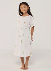A Model Wearing White Linen Kids Rasa Floral Printed Linen Dress- White, curated by Only Ethikal