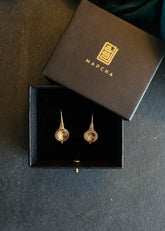 A Model Wearing Gold 18k Gold plated over brass Gold Tam Tara Earrings, curated by Only Ethikal