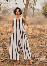 A Model Wearing White Cotton Mul PatioJumpsuit,curated by Only Ethikal