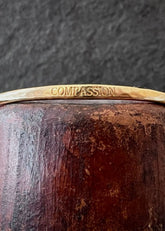 A Model Wearing Gold 18k Gold plated over brass Gold Basic Compassion Bangle, curated by Only Ethikal