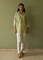 A Model Wearing Green Linen Risa Stripe Linen Shirt- Meadow, curated by Only Ethikal