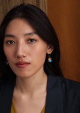 A Model Wearing Gold 18k Gold plated over brass Coral + Turquoise Drop Earrings, curated by Only Ethikal