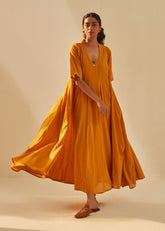 A Model Wearing Gold Cotton Mul Gold Rush, curated by Only Ethikal