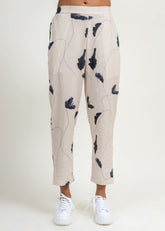A Model Wearing Multicolor Upcycled Cotton Tapered Printed Pants, curated by Only Ethikal