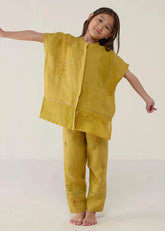 A Model Wearing Yellow Linen Kids Aboli Patchwork Linen Shirt- Ochre, curated by Only Ethikal