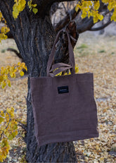 A Model Wearing Brown Cotton Canvas Ash Brown Bakhor Appliqué Canvas Tote, curated by Only Ethikal