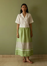 A Model Wearing Green Linen Ora Pleated Border Linen Skirt- Meadow, curated by Only Ethikal