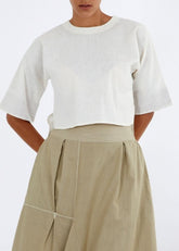 A Model Wearing White Pure Cotton Ivory Crop Top Natural White Top, curated by Only Ethikal