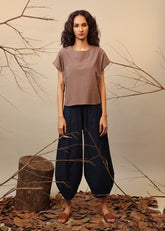 A Model Wearing Blue, Brown, Beige, Green Pure Cotton Roots Suga Pants, curated by Only Ethikal