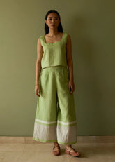A Model Wearing Green Linen Della Border Linen Culottes- Meadow, curated by Only Ethikal